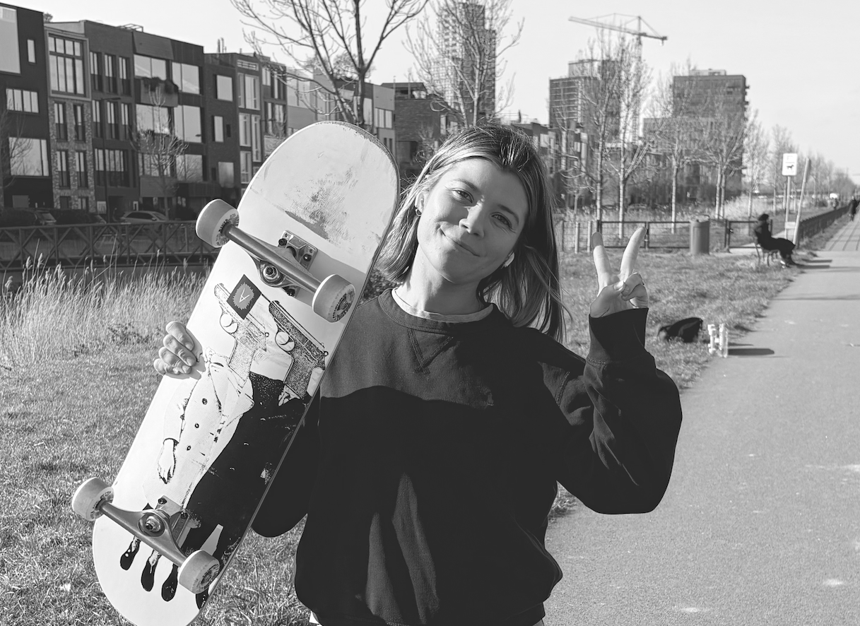 Taylor holding skateboard